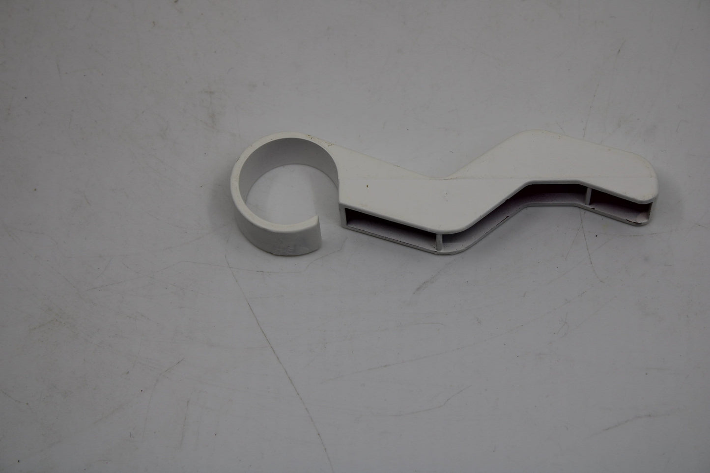 Original and used Maxi Swatch pin for buckle, painted white