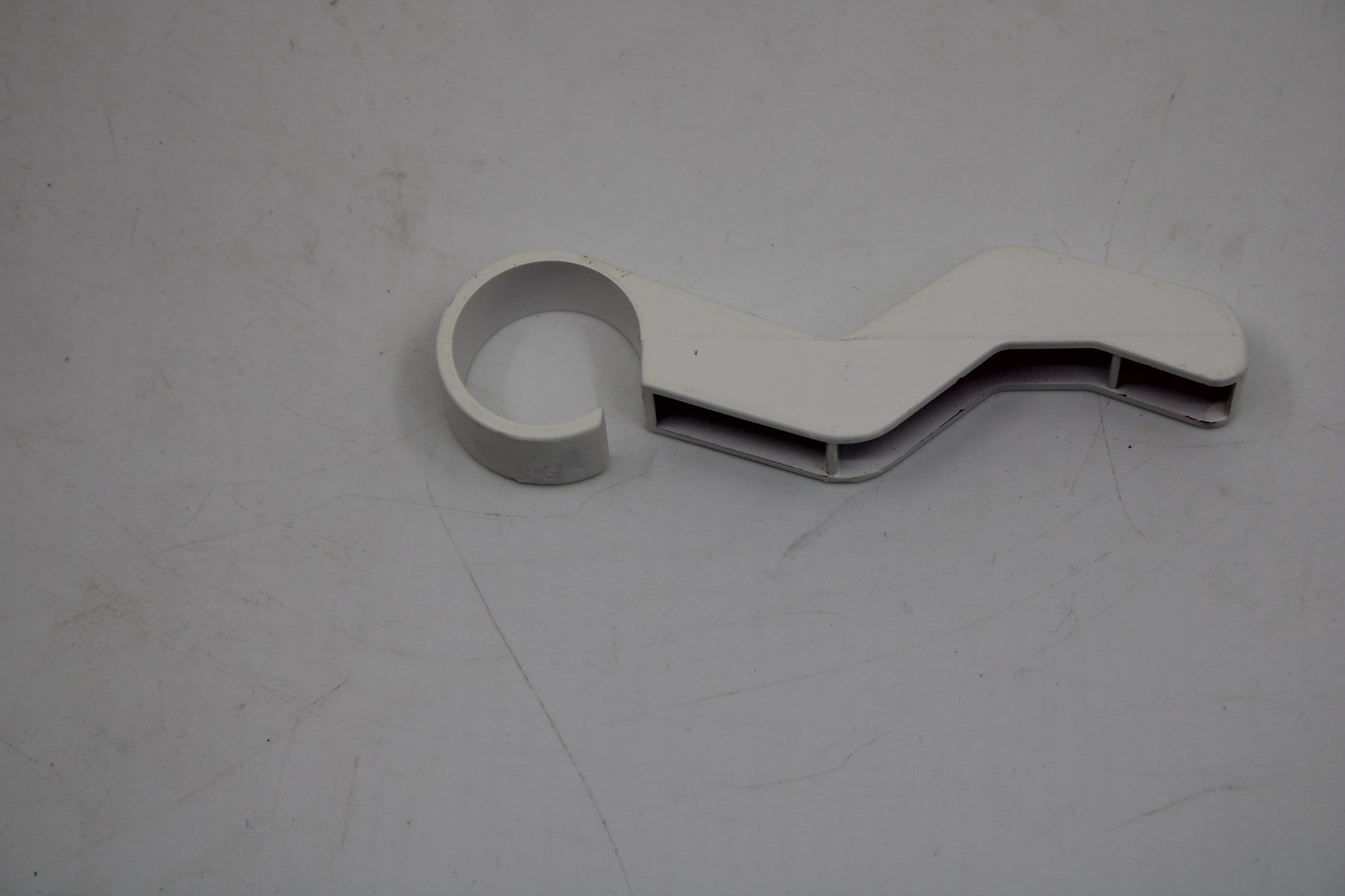 Original and used Maxi Swatch pin for buckle, painted white