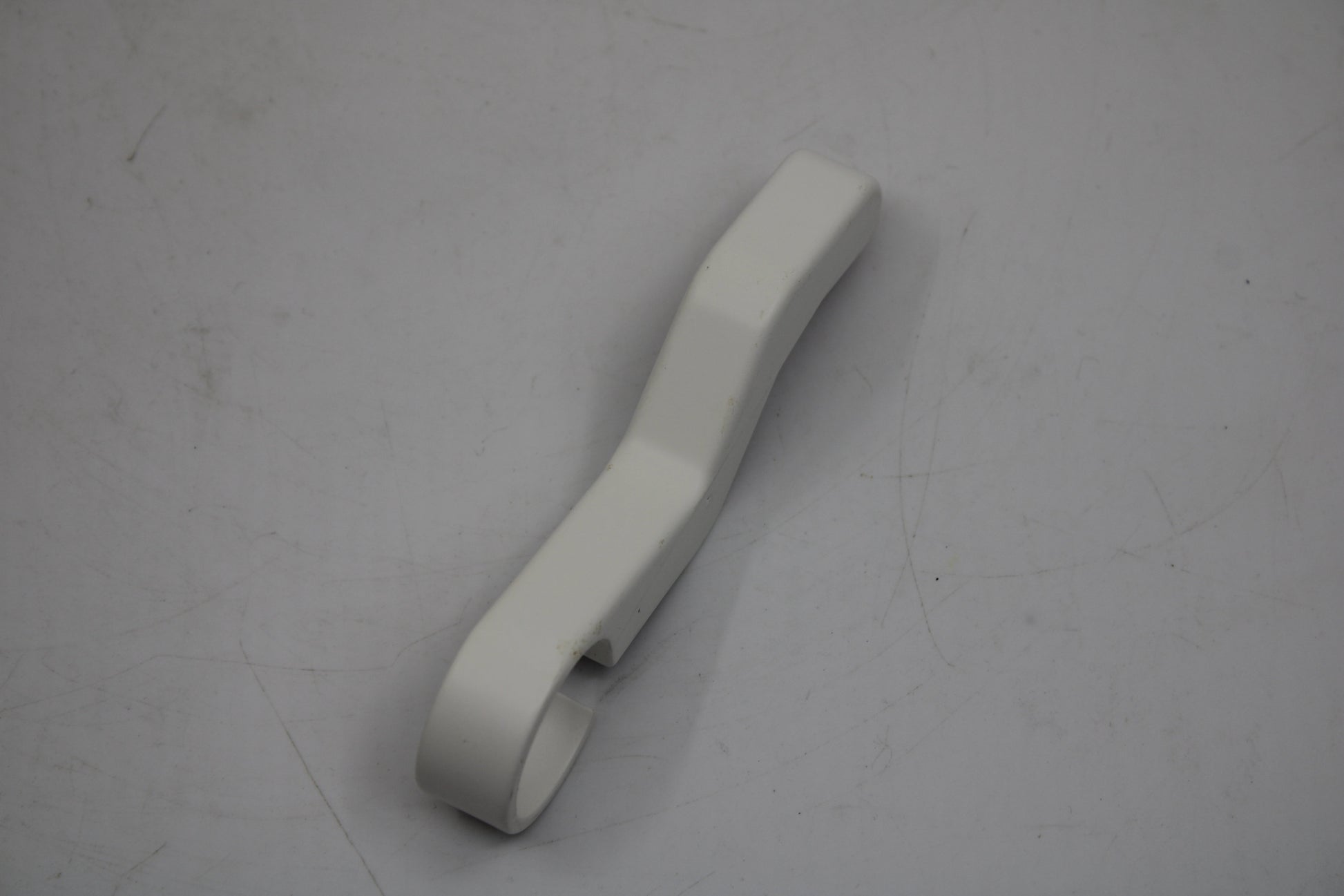 Original and used Maxi Swatch pin for buckle, painted white