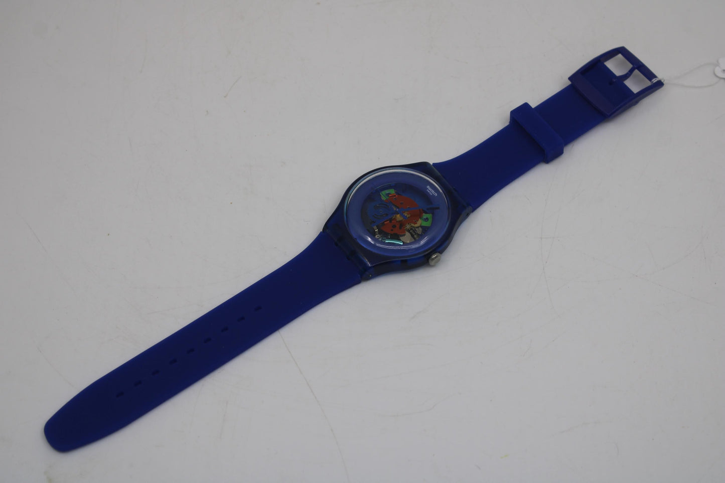 Vintage New Gents Swatch 'Indigo Lacquered' SUON101, in good condition, working 100% with a brandnew strap