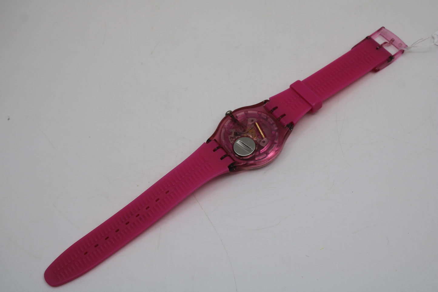Vintage New Gents Swatch 'Pink Lacquered' SUOP100, in good condition, working 100% with the original strap