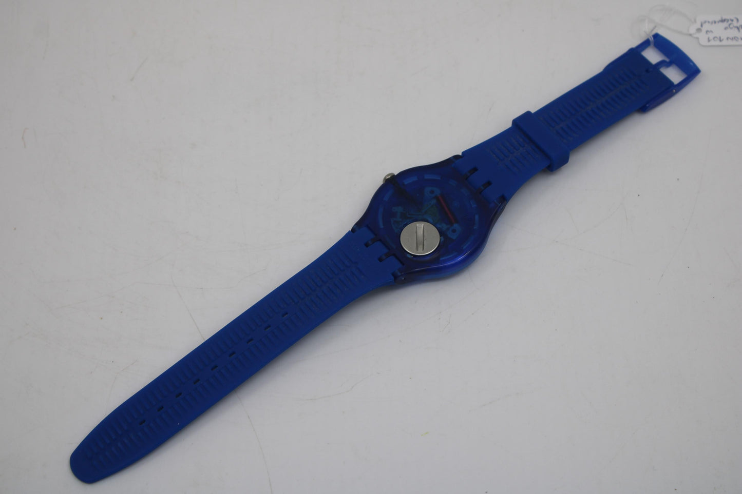 Vintage New Gents Swatch 'Indigo Lacquered' SUON101, in good condition, working 100% with the original strap