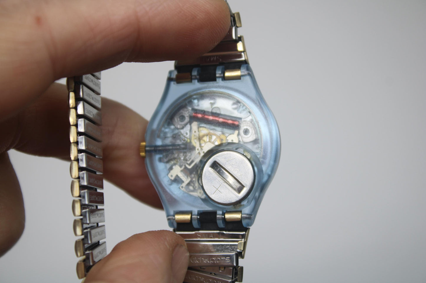 1992 Vintage Gents Swatch 'Gold Smile' GN123/124, unworn, new old stock condition with the original strap
