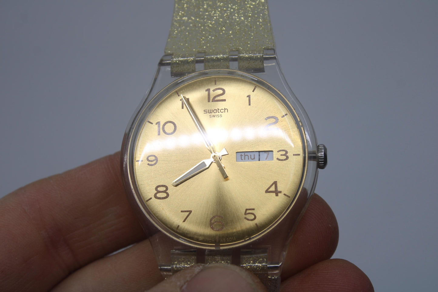 Vintage New Gents Swatch 'Golden Sparkle' SUOK704, in Mint Condition, working, with the original strap