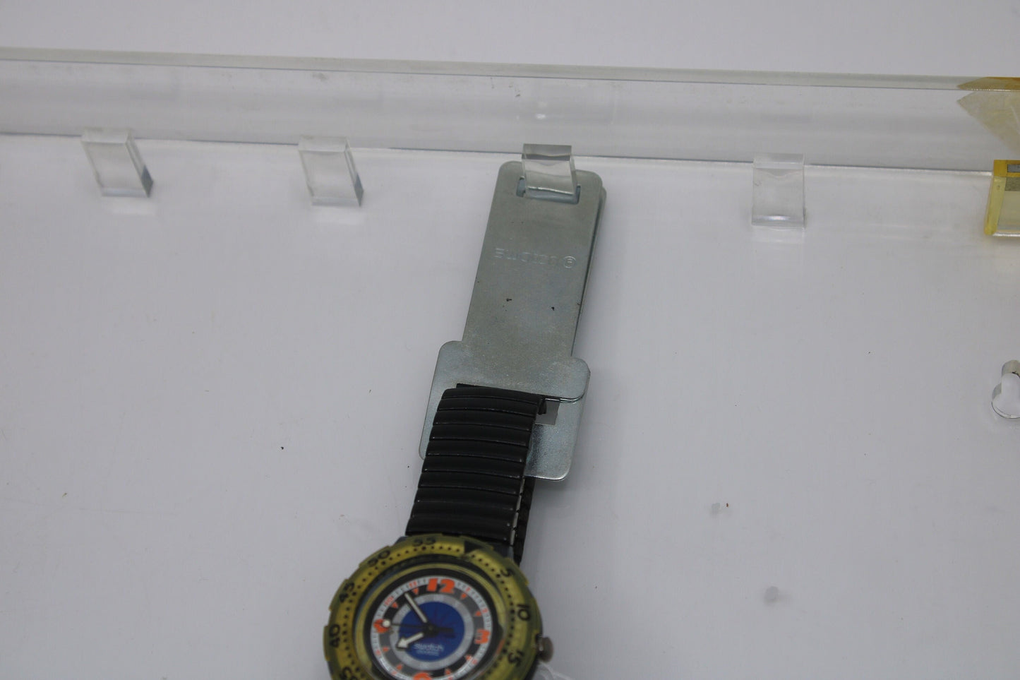 Vintage Swatch metal bracket / holder for display case, for holding a (one) Swatch with flexi strap, VERY rare