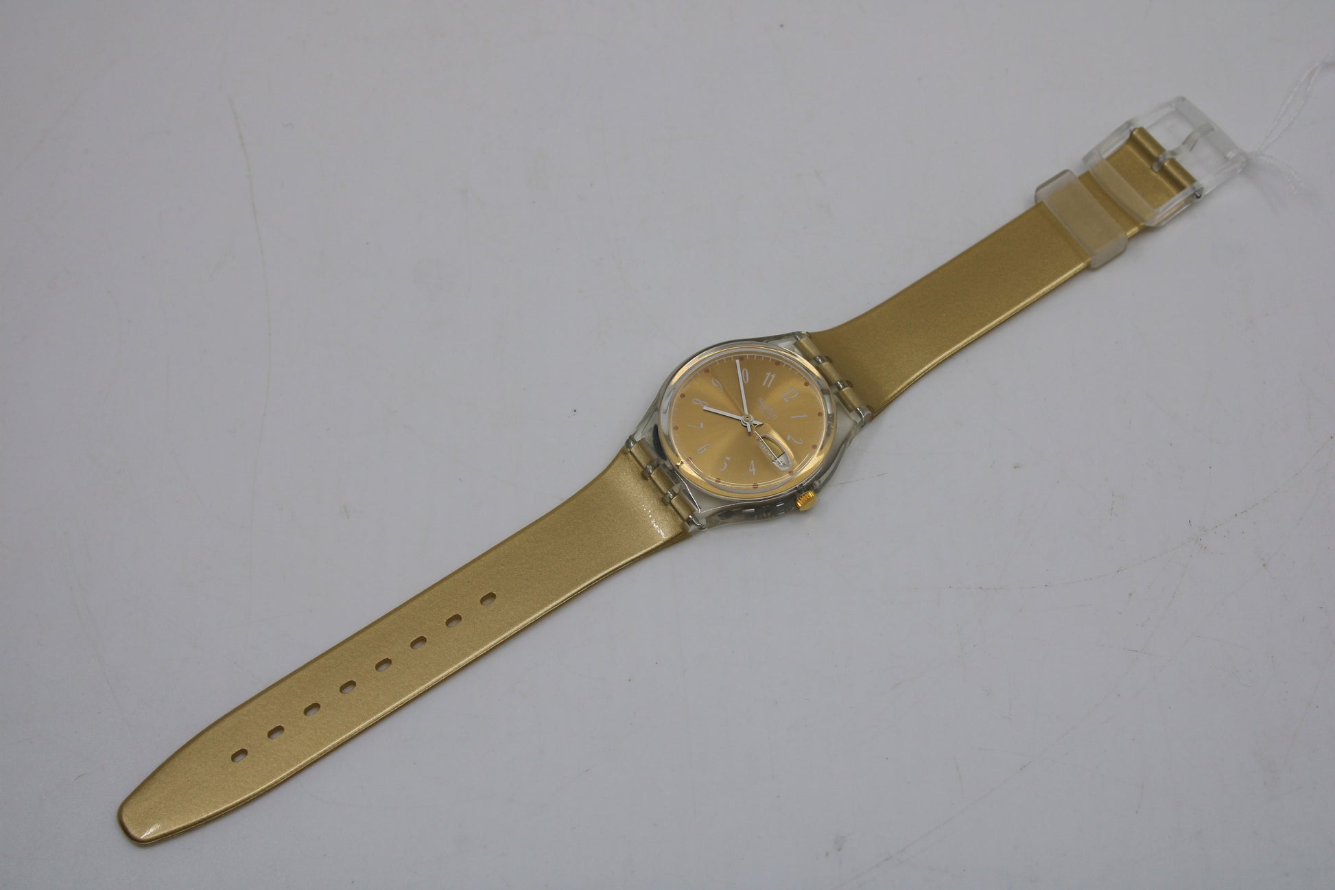 NEW OLD STOCK 1994 Vintage Gents Swatch 'Gold Breeze' GK710, working 100% with the original strap