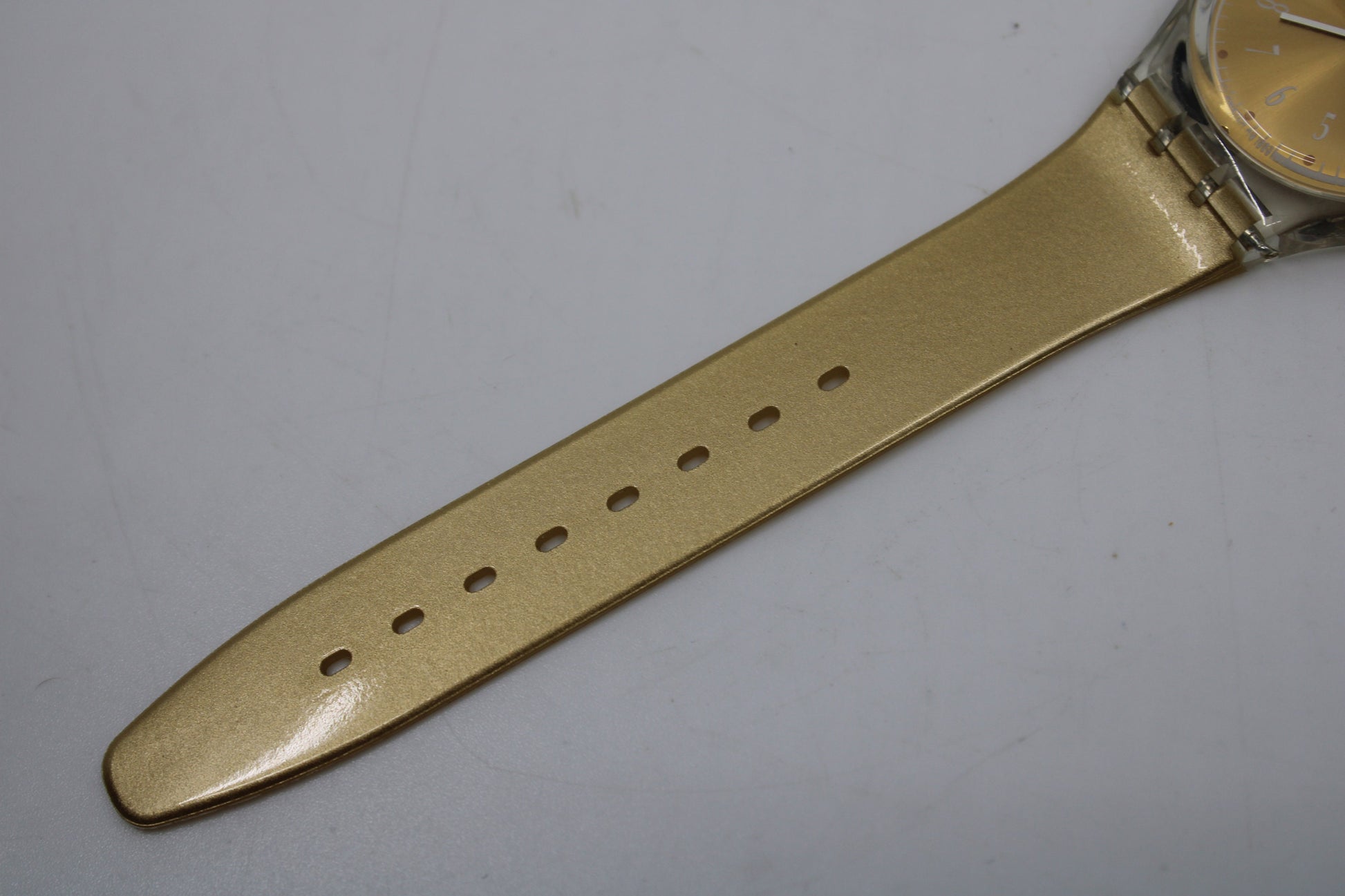 NEW OLD STOCK 1994 Vintage Gents Swatch 'Gold Breeze' GK710, working 100% with the original strap