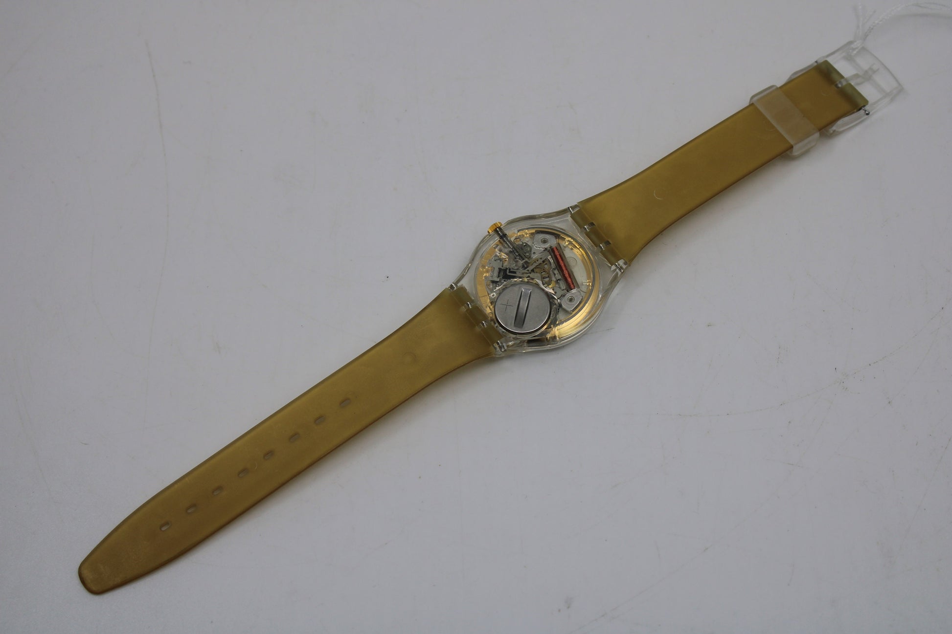 NEW OLD STOCK 1994 Vintage Gents Swatch 'Gold Breeze' GK710, working 100% with the original strap