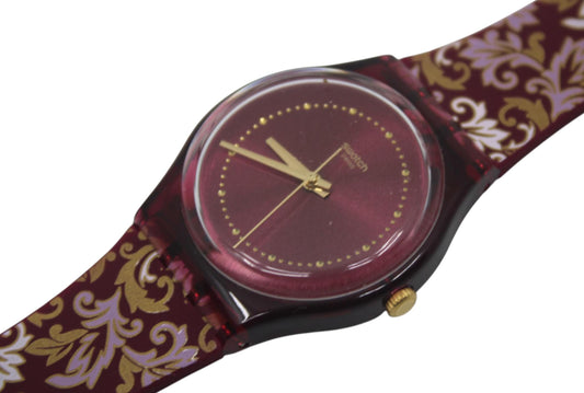 This is a nice, vintage, unworn Gents 34mm Swatch called the Damask, model numberGR179
