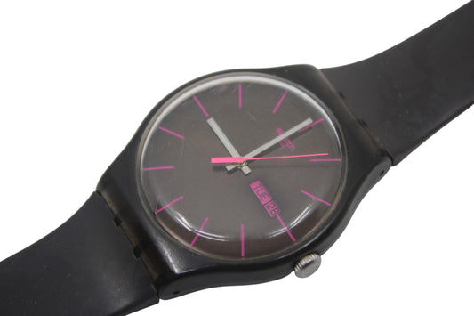This is a nice vintage 41mm Swatch watch, brown rebel, model number SUOC700
