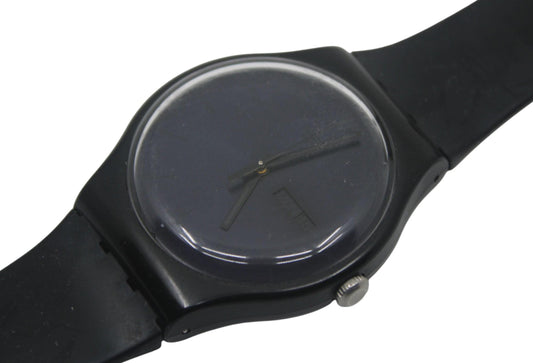 This is a very nice vintage 41mm new gents Swatch watch, called the Black Rebel, model number SUOB702