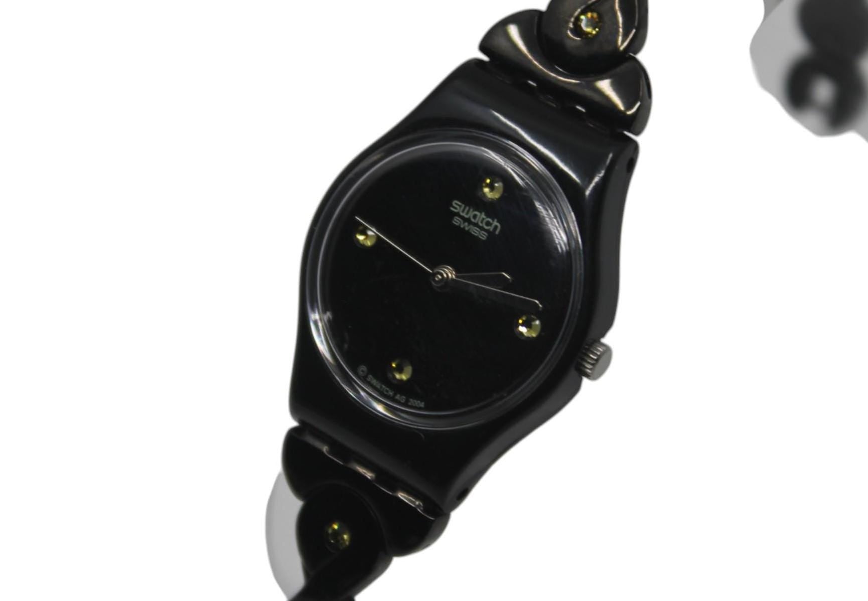 Ladies 25mm Swatch watch, called Noir Tresse, model number LB162G