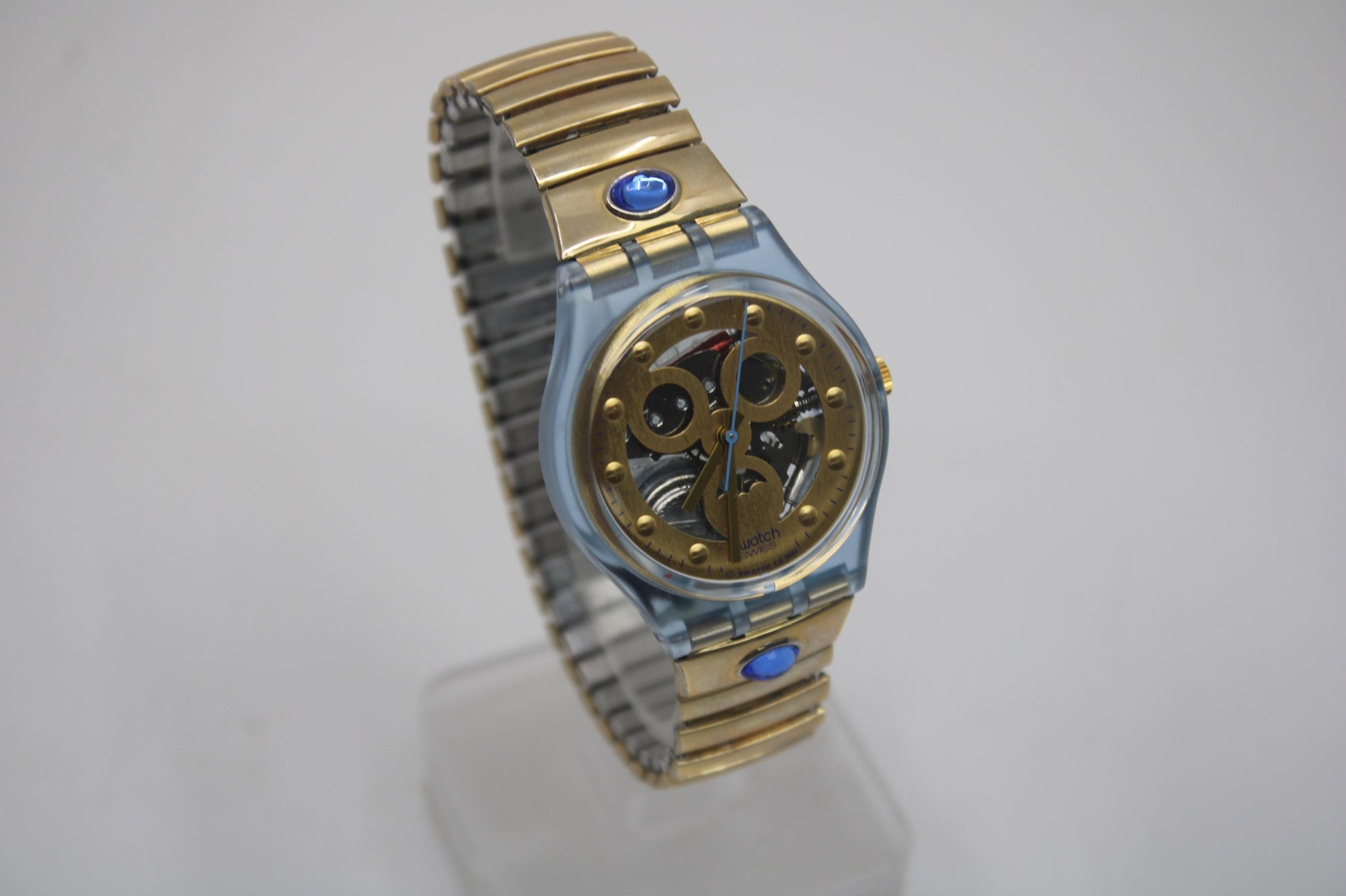 1992 Vintage Gents Swatch 'Gold Smile' GN123/124, unworn, new old stock condition with the original strap