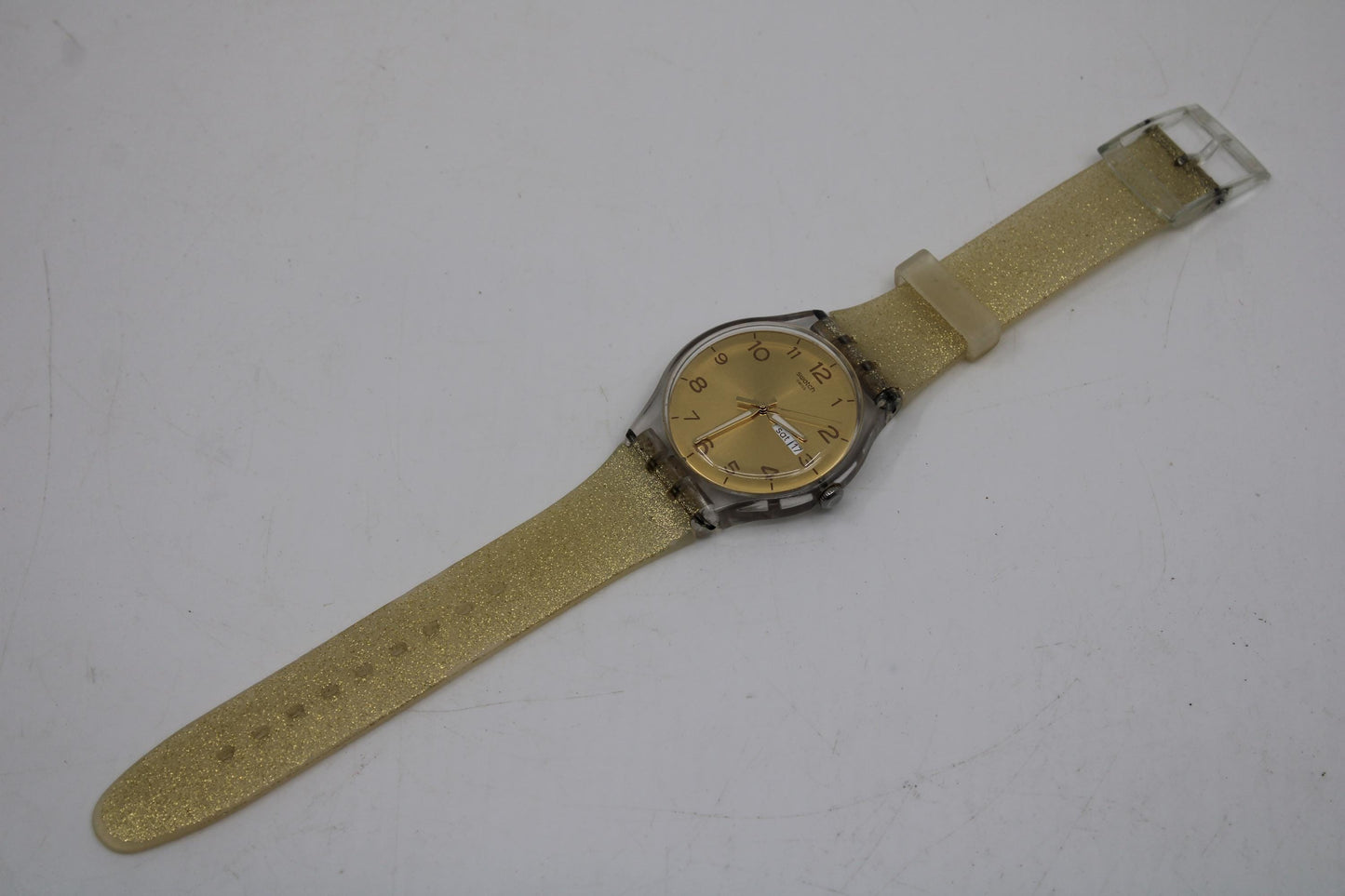 New Gents Swatch 'Golden Sparkle' SUON101, in used condition, working fine with the original strap