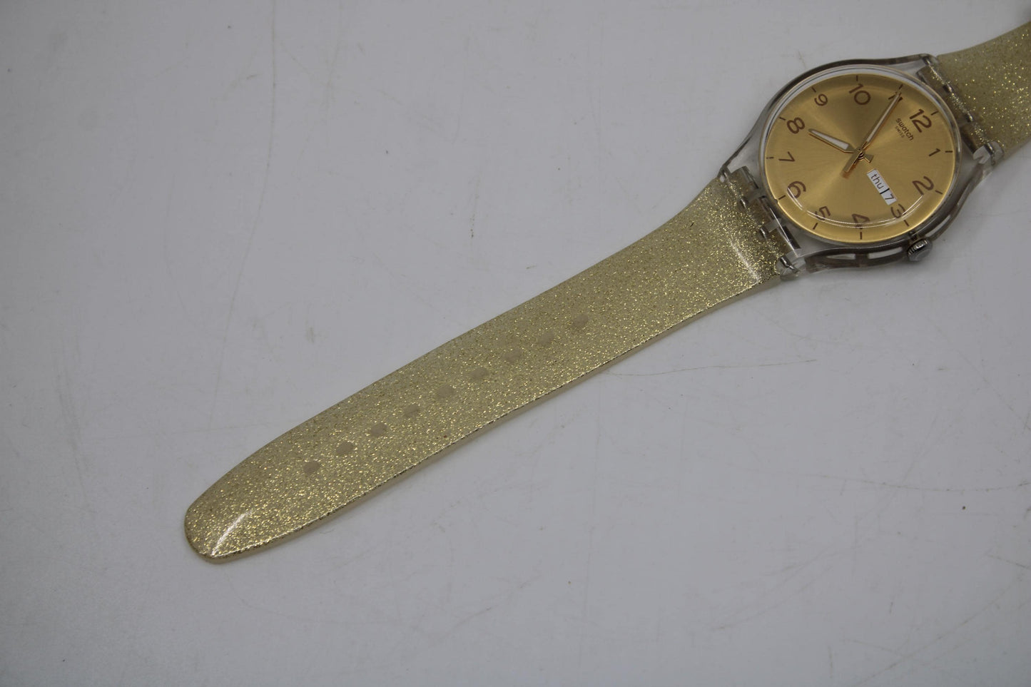 Vintage New Gents Swatch 'Golden Sparkle' SUOK704, in Mint Condition, working, with the original strap