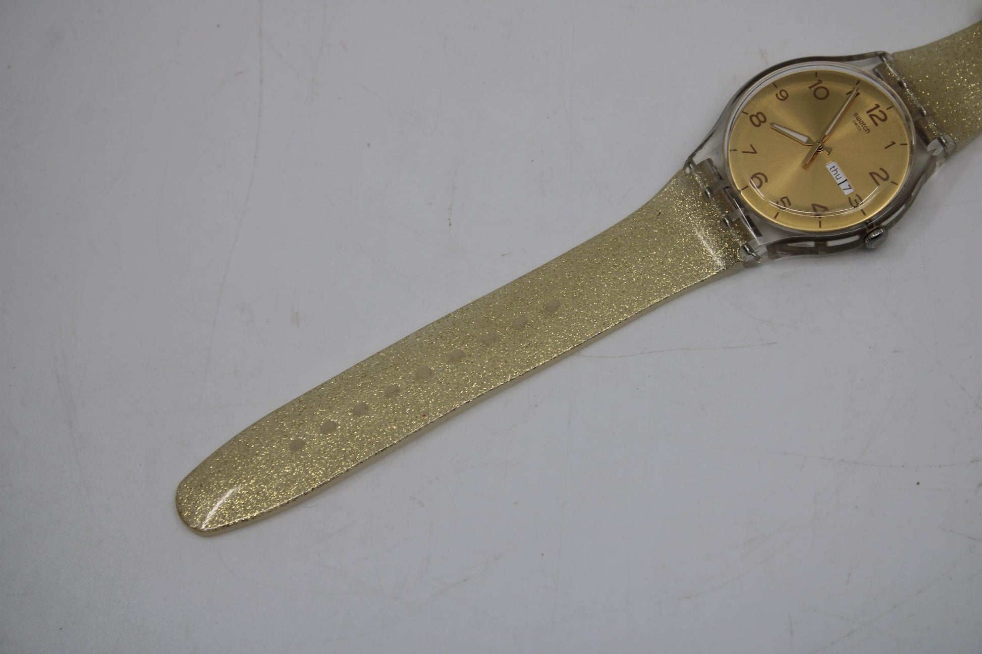 Vintage New Gents Swatch 'Golden Sparkle' SUOK704, in Mint Condition, working, with the original strap