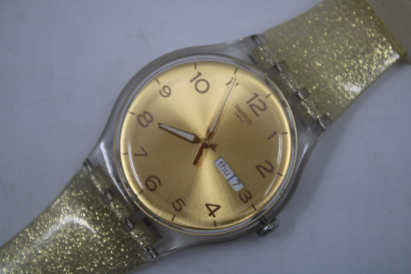 Vintage New Gents Swatch 'Golden Sparkle' SUOK704, in Mint Condition, working, with the original strap
