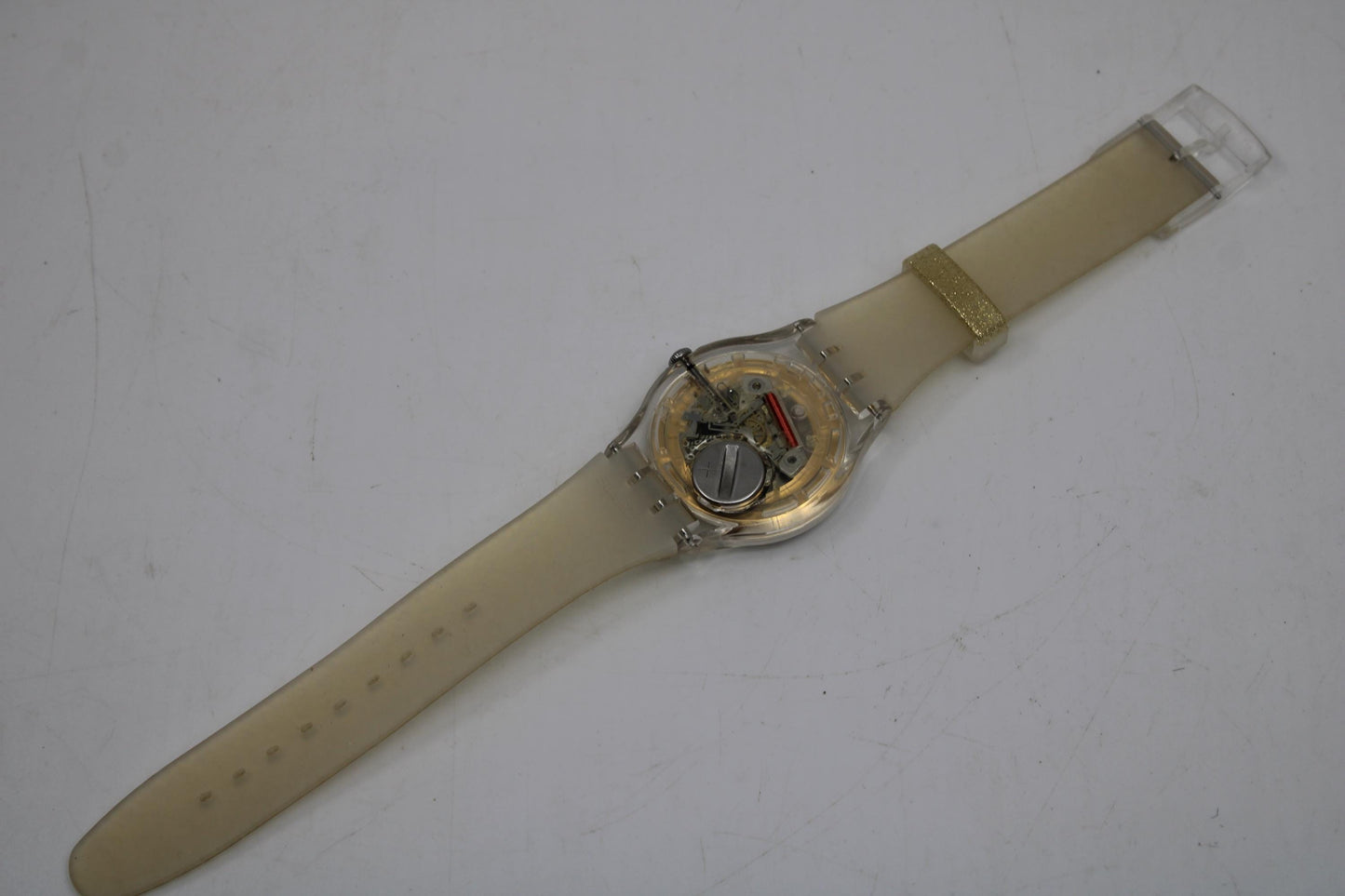 Vintage New Gents Swatch 'Golden Sparkle' SUOK704, in Mint Condition, working, with the original strap