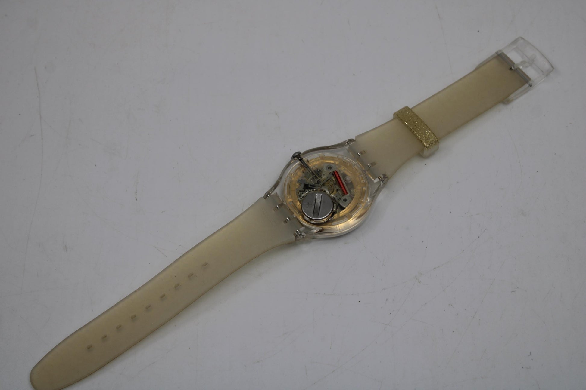 Vintage New Gents Swatch 'Golden Sparkle' SUOK704, in Mint Condition, working, with the original strap
