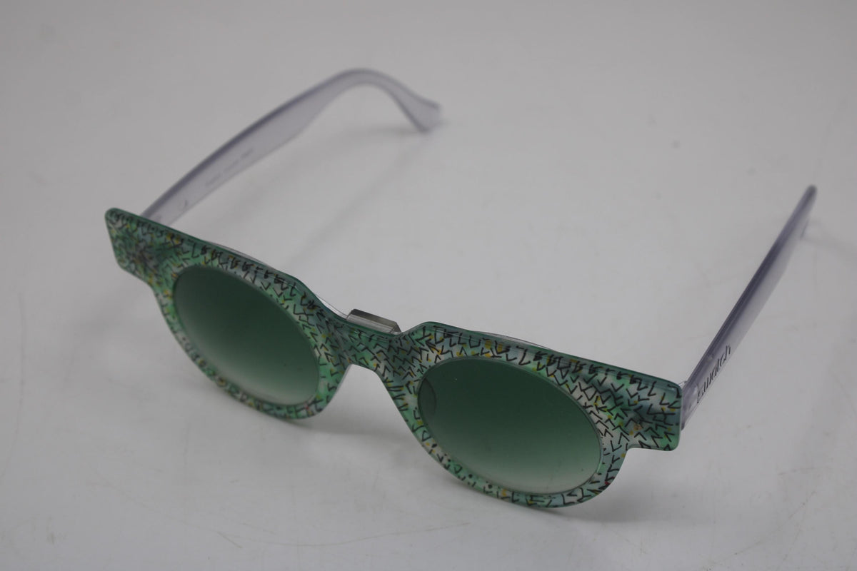 90s early and vintage Swatch sunglasses, nice, used condition. Removable Front