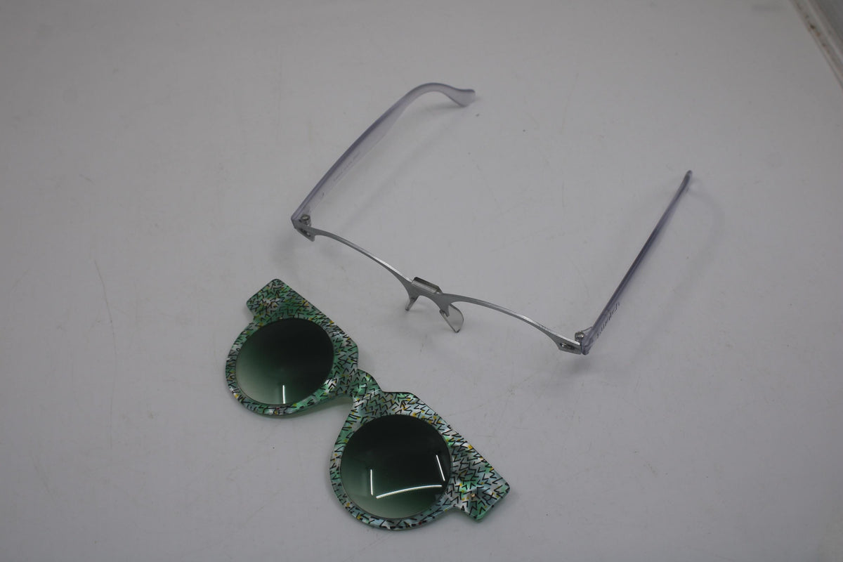 90s early and vintage Swatch sunglasses, nice, used condition. Removable Front
