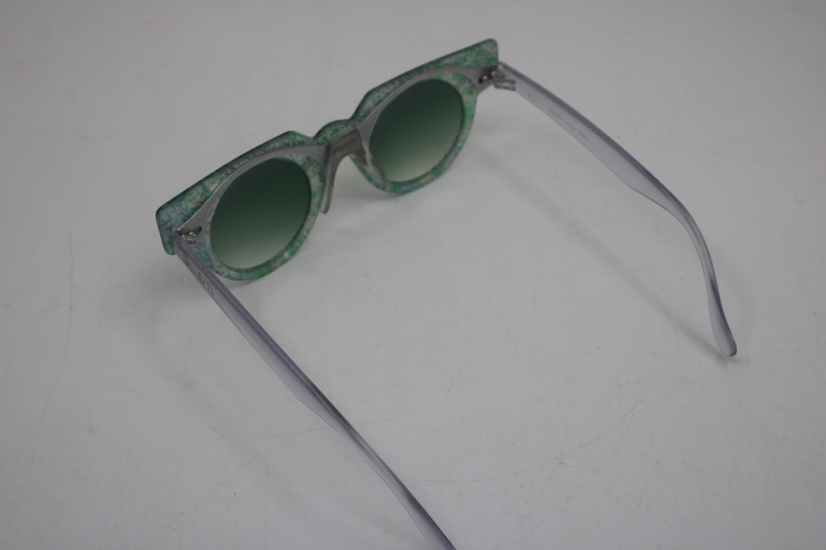 90s early and vintage Swatch sunglasses, nice, used condition. Removable Front