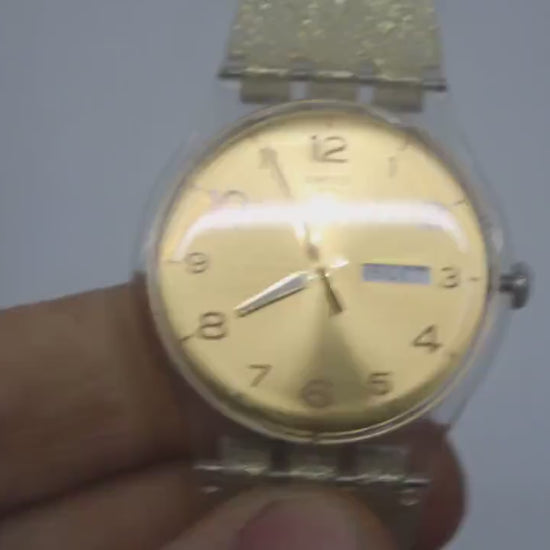 Vintage New Gents Swatch 'Golden Sparkle'  SUOK704, in Mint Condition, working, with the original strap