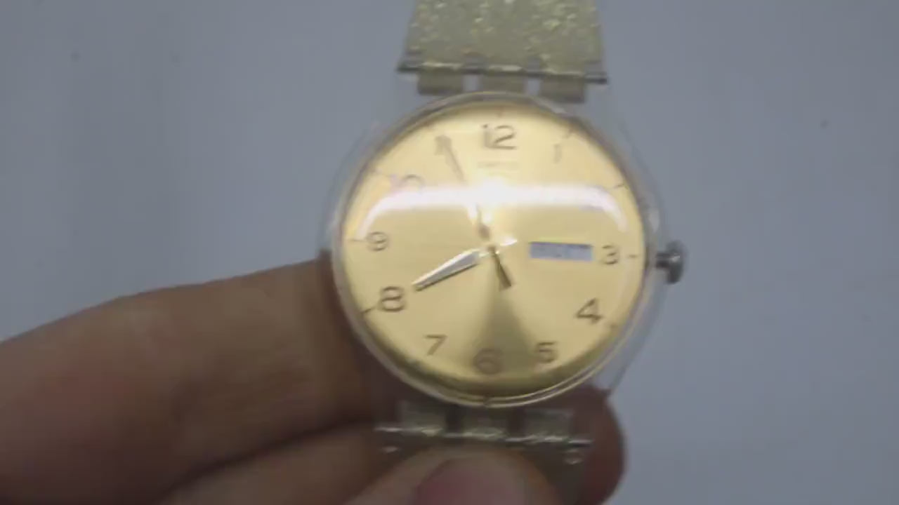 Vintage New Gents Swatch 'Golden Sparkle'  SUOK704, in Mint Condition, working, with the original strap