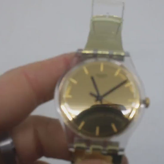 Vintage New Gents Swatch 'Goldenall'  SUOK120, Unworn, New Old Stock, working, with the original strap