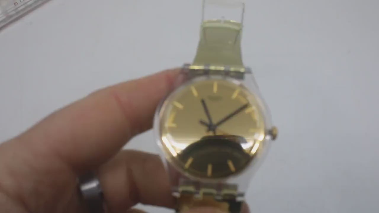 Vintage New Gents Swatch 'Goldenall'  SUOK120, Unworn, New Old Stock, working, with the original strap